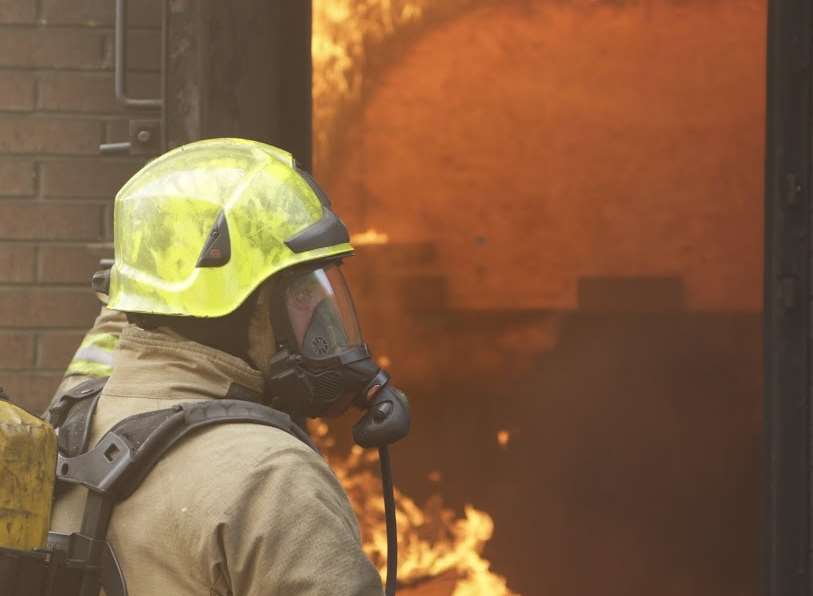 Firefighters wearing breathing apparatus tackled the blaze. Stock picture