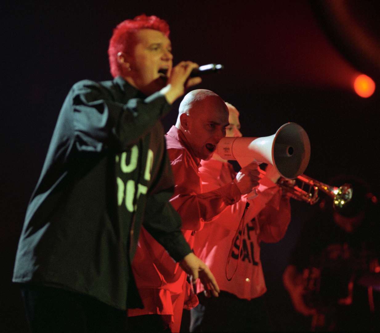 Chumbawamba perform their hit single Tubthumping at the start of the Brit Awards ceremony in 1998 (Fiona Hanson/PA)