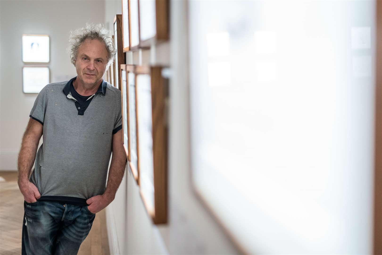 Charlie Mackesy with his Sotheby’s exhibition (Aaron Chown/PA)