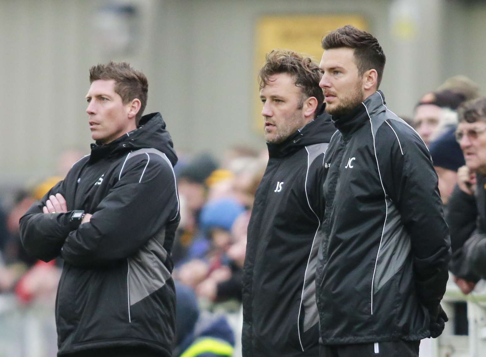 Maidstone manager Jay Saunders (centre) with assistant Nicky Southall and player-coach Jamie Coyle Picture: Martin Apps