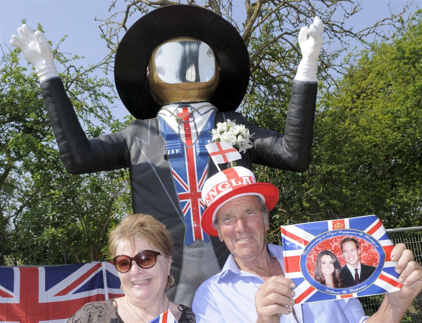 Cllr Val Harris and Dave Purssord with the Big Man, painted as a groom, ahead of the Royal Wedding in 2011