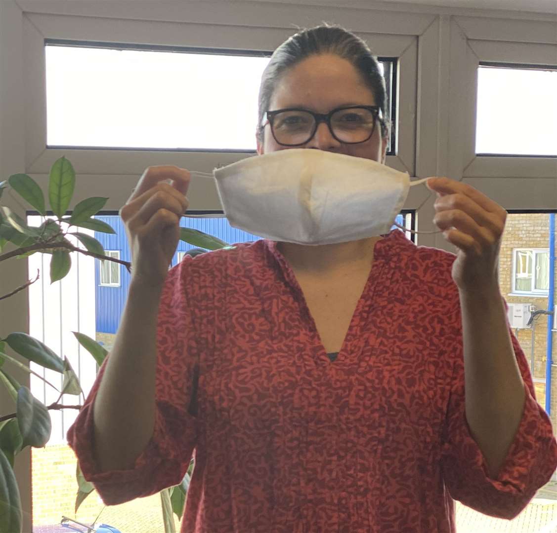 Milene Rocha-Albuquerque with one of the surgical masks. Picture: Britt Grutzmacher