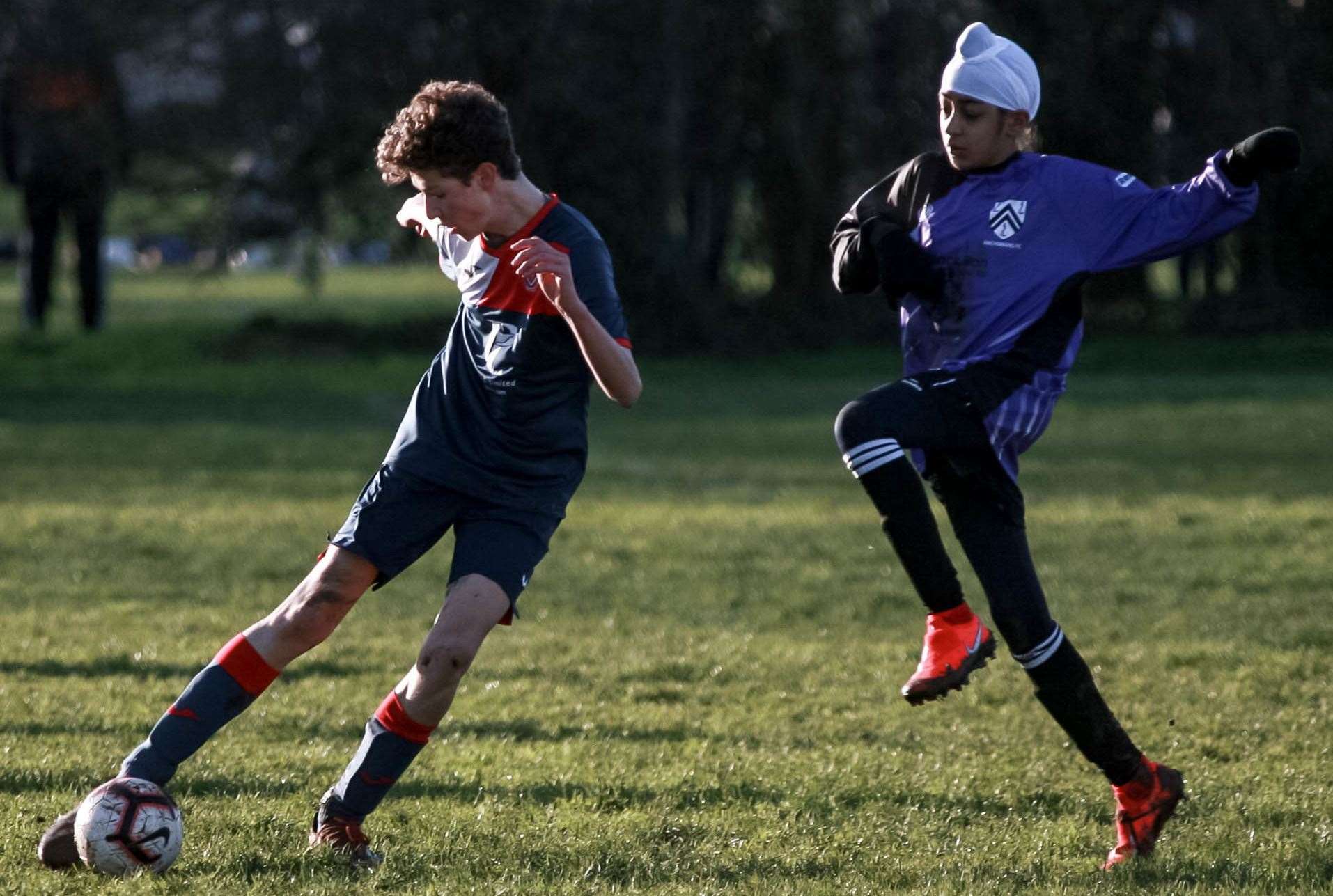 Hempstead Valley under-14s clear their lines against Anchorians Panthers under-14s. Picture: Phil Lee FM27123681