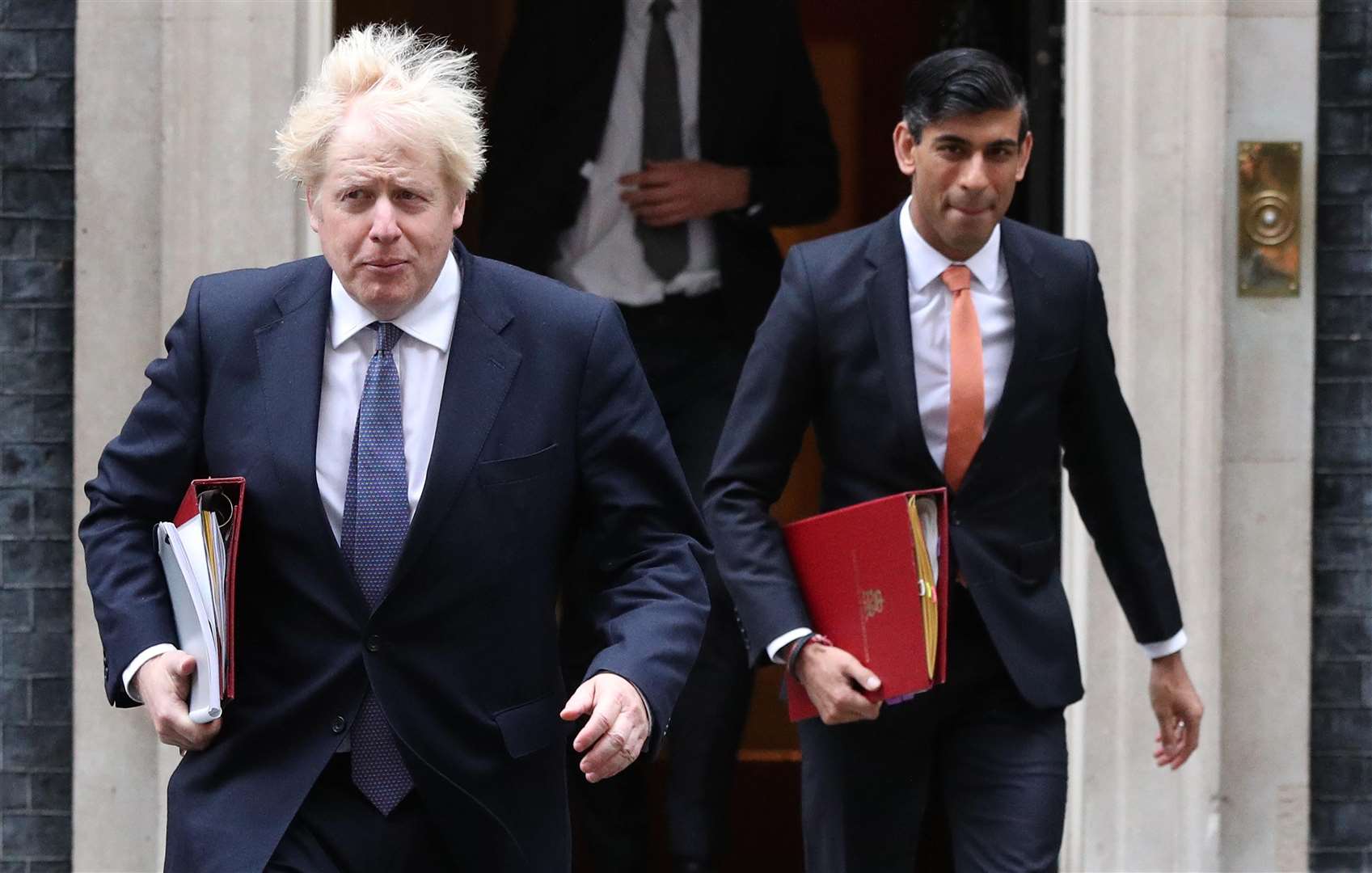 Mr Sunak said that Prime Minister Boris Johnson had had to make “impossibly hard” decisions (Jonathan Brady/PA)