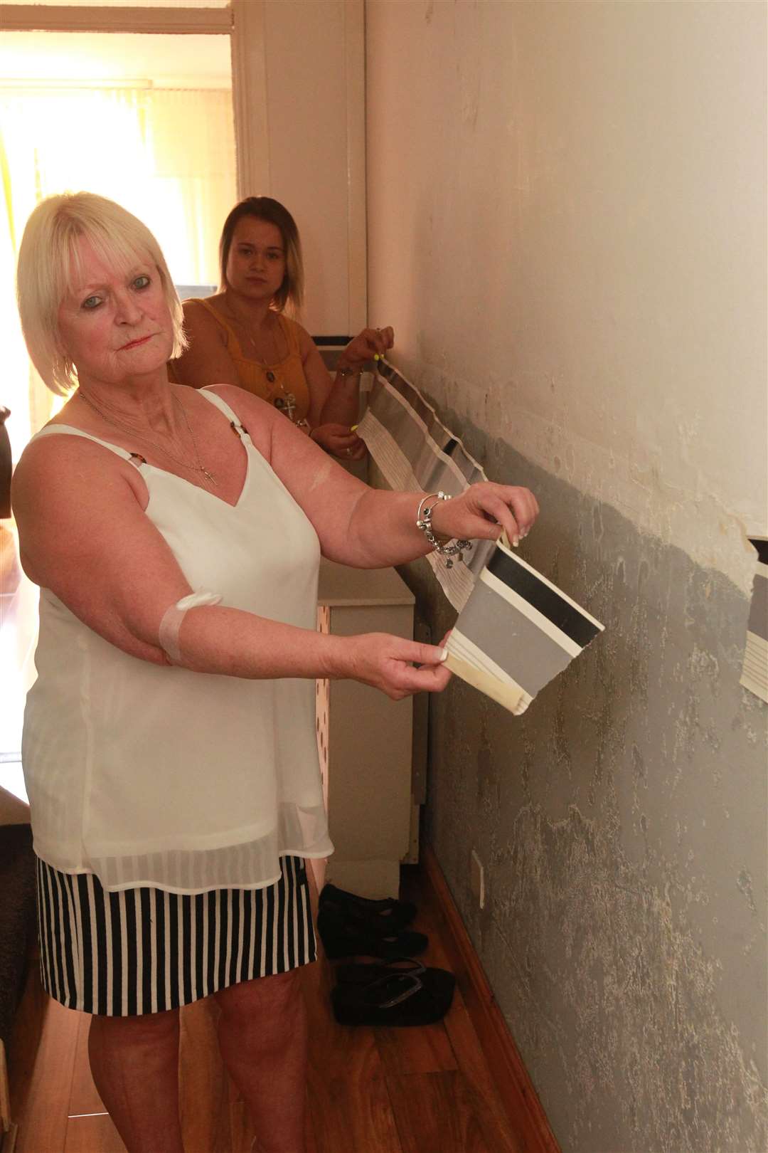 Stephen Care is extremely worried about the electrics coming into contact from leaky pipes from the water tank in his flat. Picture: John Westhrop. (11079384)