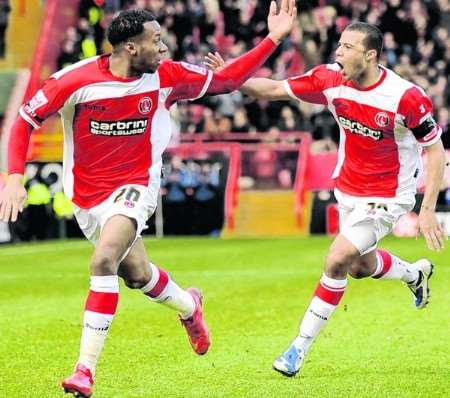 Therry Racon (peft) celebrates the opening goal with Tom Soares. Picture: Barry Goodwin