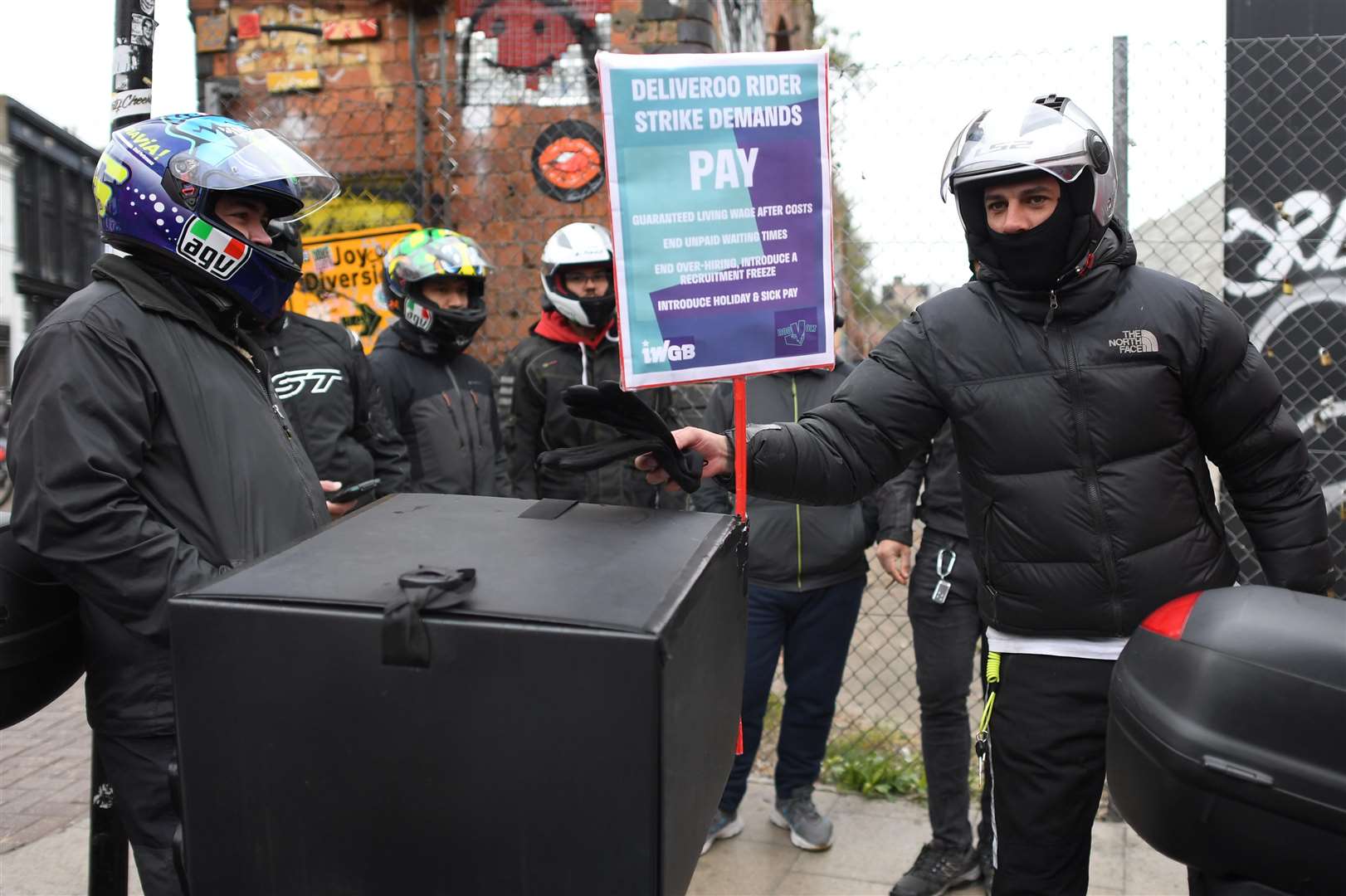 Deliveroo riders in Shoreditch High Street (Stefan Rousseau/PA)