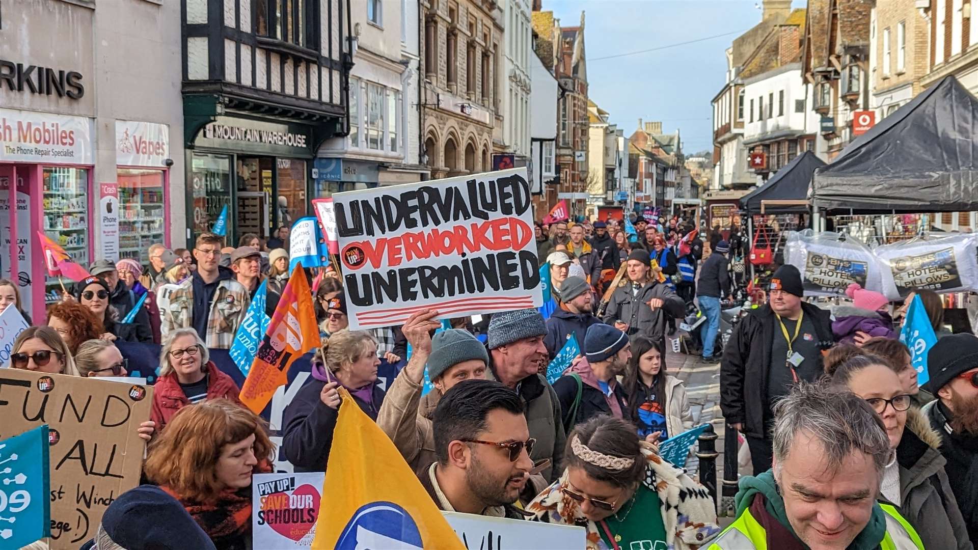 Teachers go on a march through Canterbury as part of a day of national strikes