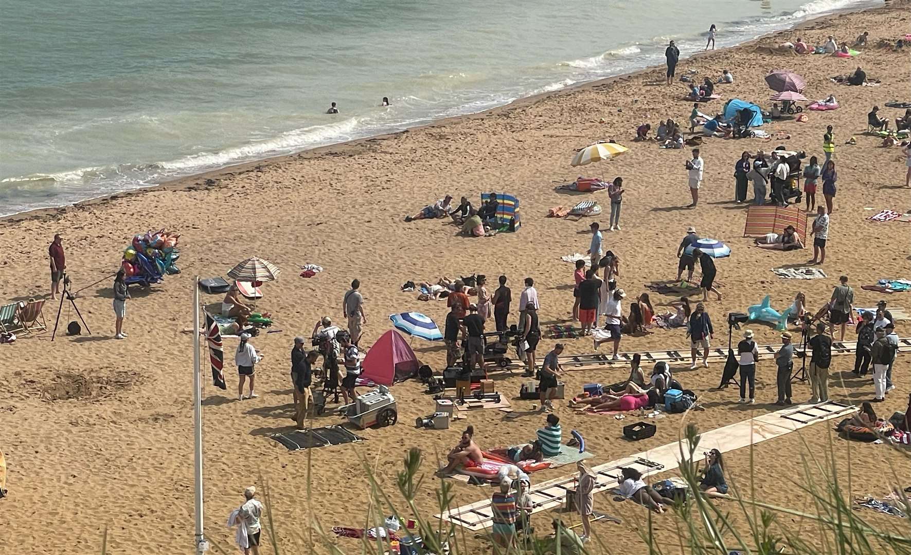 Production crews filming the ad featuring Dua Lipa on Viking Bay in Broadstairs in May