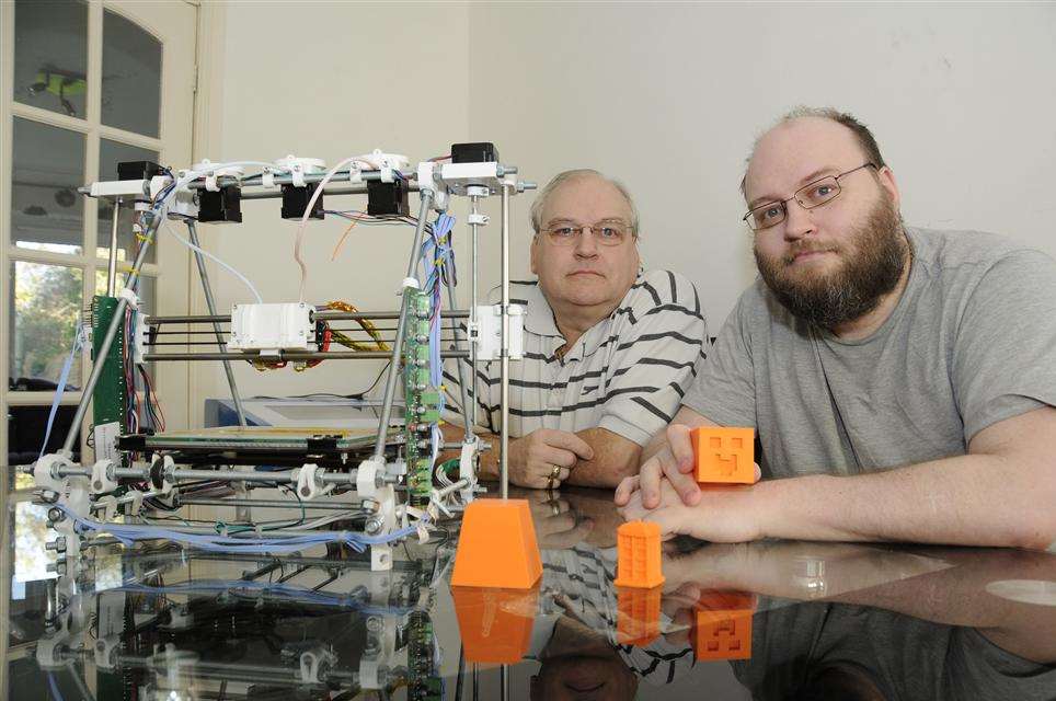 Stephen and Dean Calver with the printer