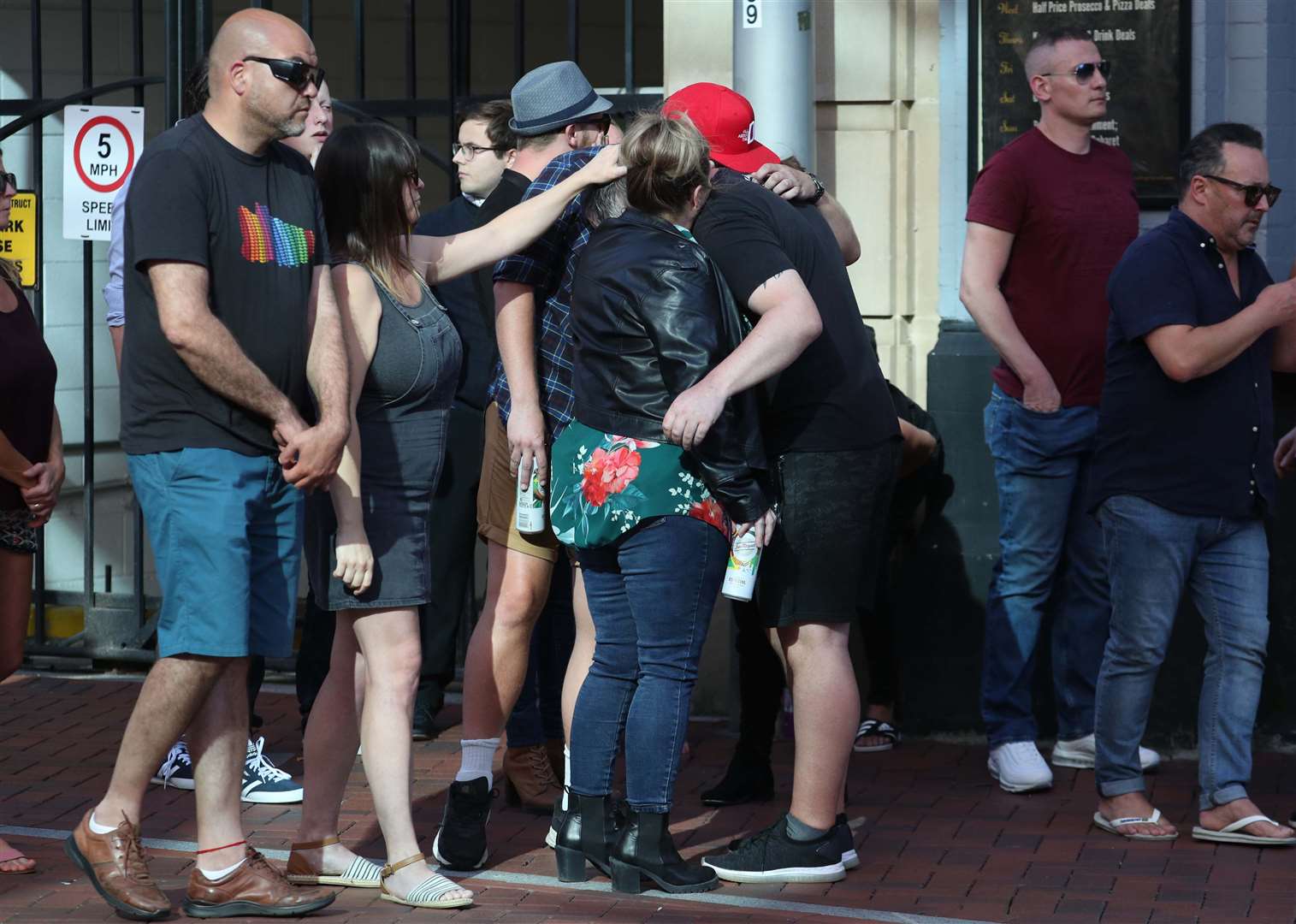 Mourners gather outside The Blagrave Arms near Forbury Gardens (Steve Parsons/PA)