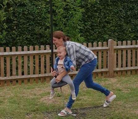 Samantha Ford with one of the children. Picture: Facebook