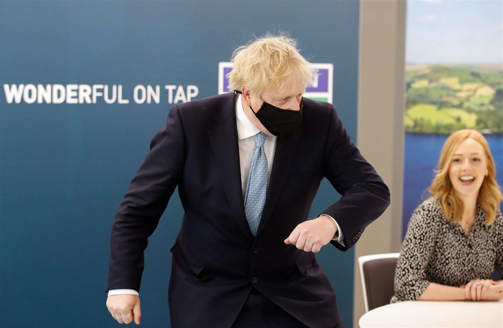 Mr Johnson offers and elbow bump during a visit to Severn Trent Academy in Coventry (Phil Noble)