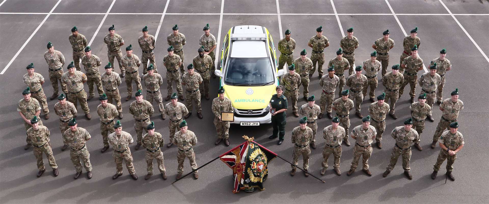 Ambulance operations manager Heather Ransom presents a commemorative plaque to the 1st Battalion Royal Irish Regiment at Shropshire’s Clive Barracks (Stuart Hay Photography)