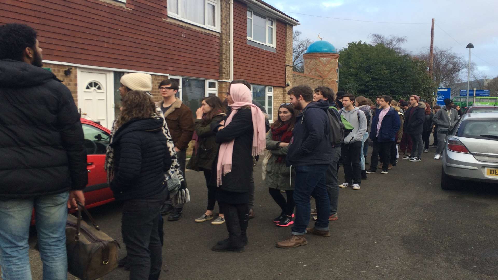 Queues of people outside the mosque