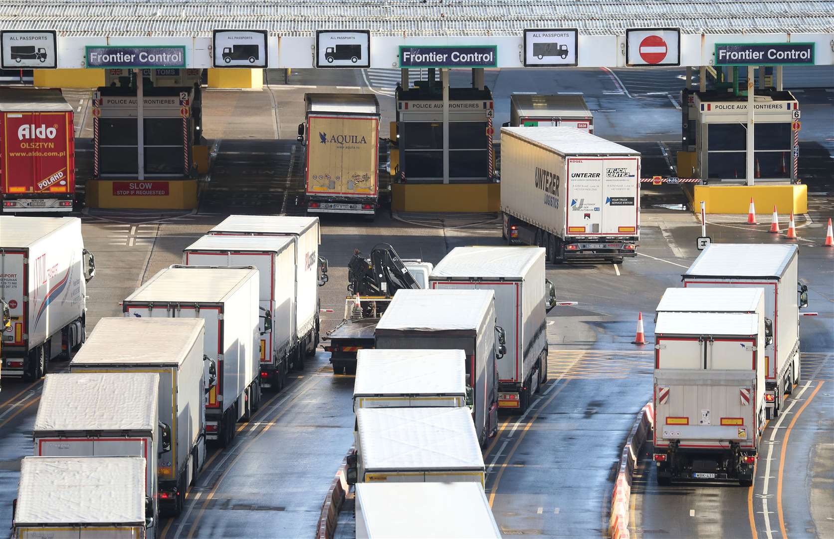 Manufacturing slowed in January as most businesses rushed to fulfil orders in December, leading to long queues at ports (Gareth Fuller / PA)