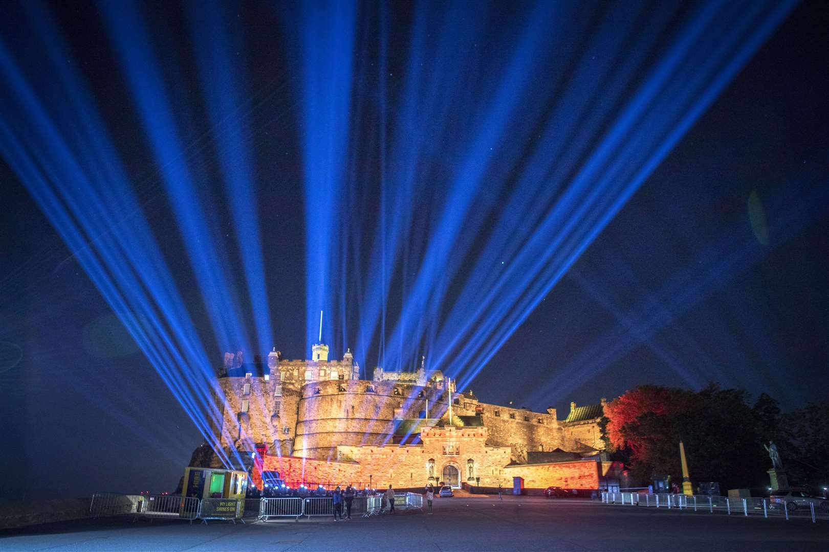 The sky above Edinburgh Castle is lit up by My Light Shines On, an outdoor light installation for the 2020 Edinburgh International Festival in August (Jane Barlow/PA)