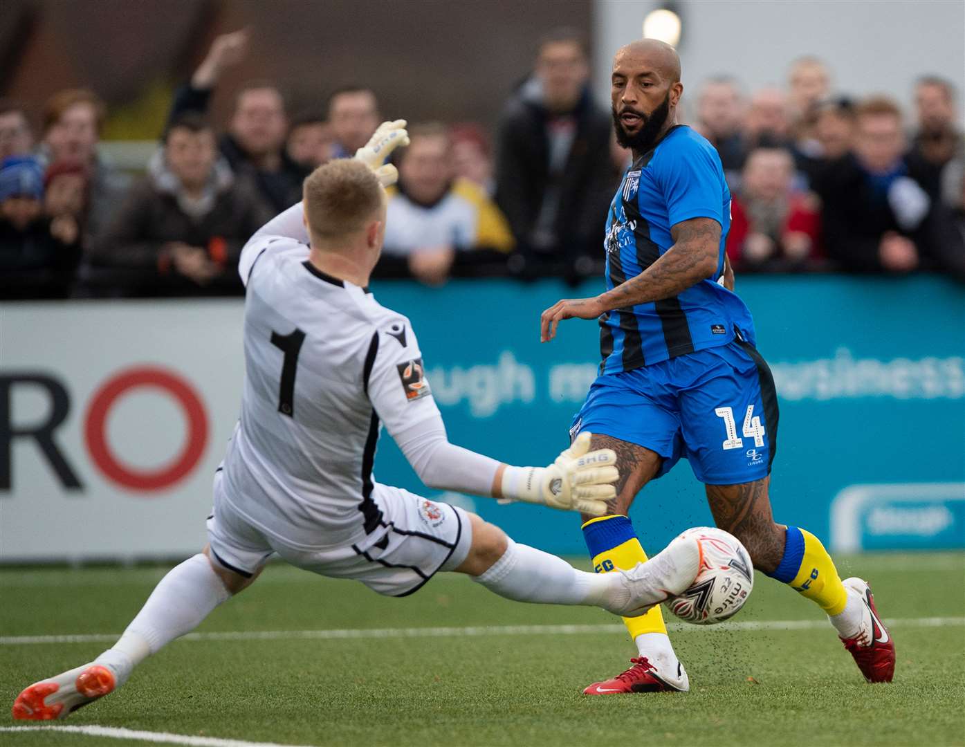 Gillingham's Josh Parker is denied by Slough keeper Jack Turner. Picture: Ady Kerry