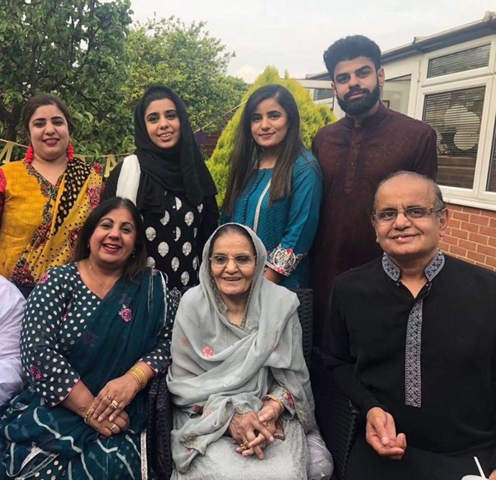 Ms Mukhtar with her family before lockdown (Hajrah Mukhtar/PA)