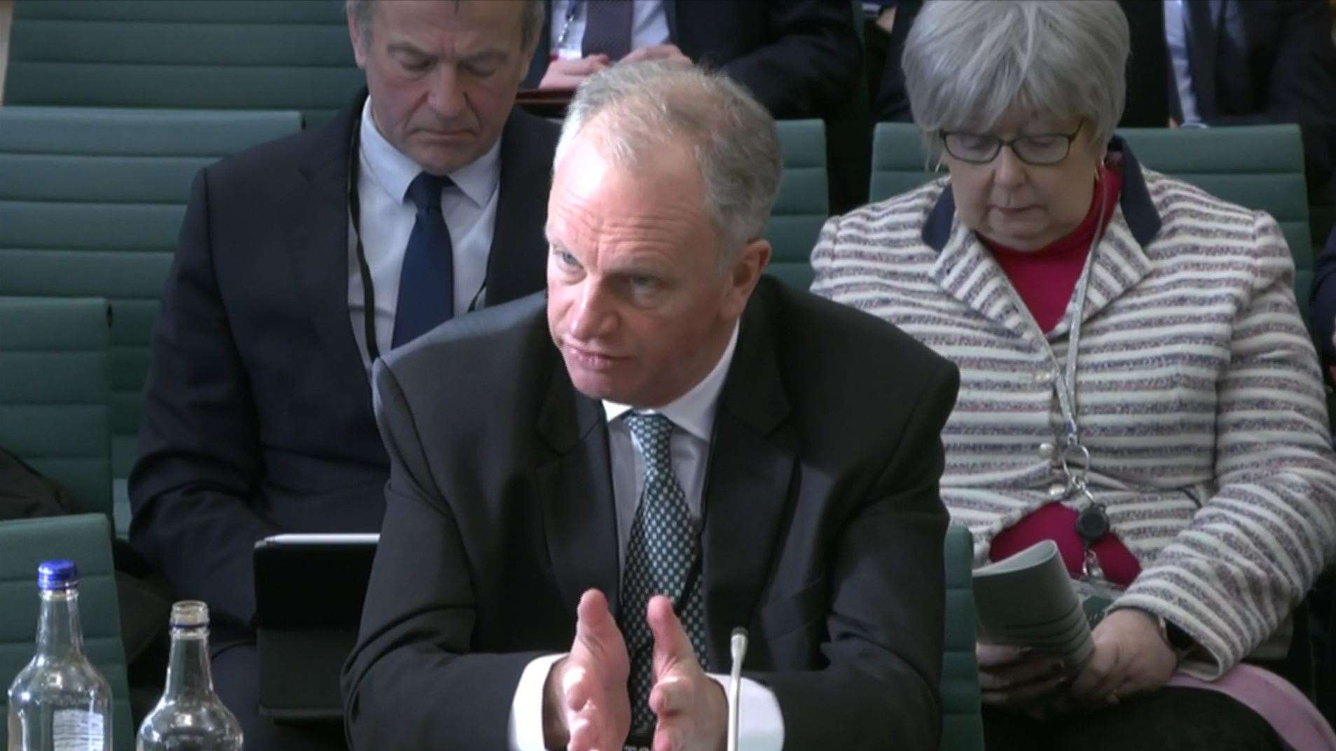 Nick Read, chief executive of the Post Office, giving evidence to the Business and Trade Committee at the Houses of Parliament, London (House of Commons/PA)