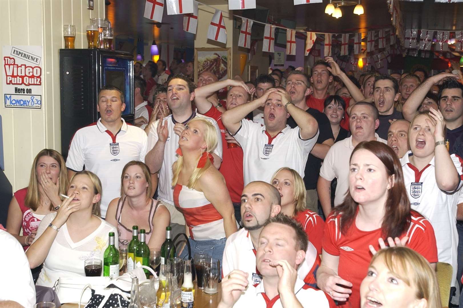 Fans at The Star in Gillingham watch England lose on penalties to Portugal in Euro 2004