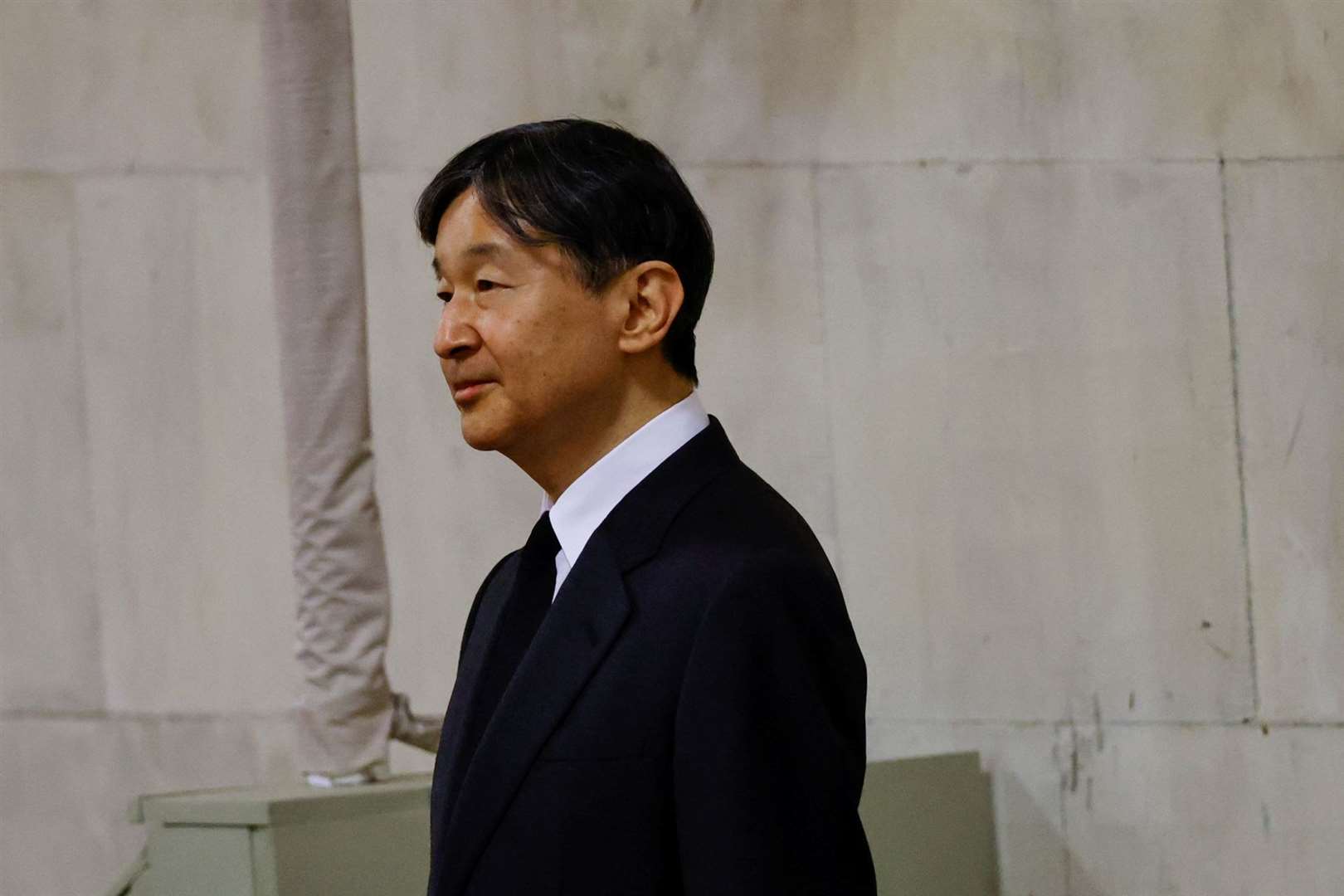 Emperor Naruhito views the coffin of Queen Elizabeth II in Westminster Hall (Sarah Meyssonnier/PA)