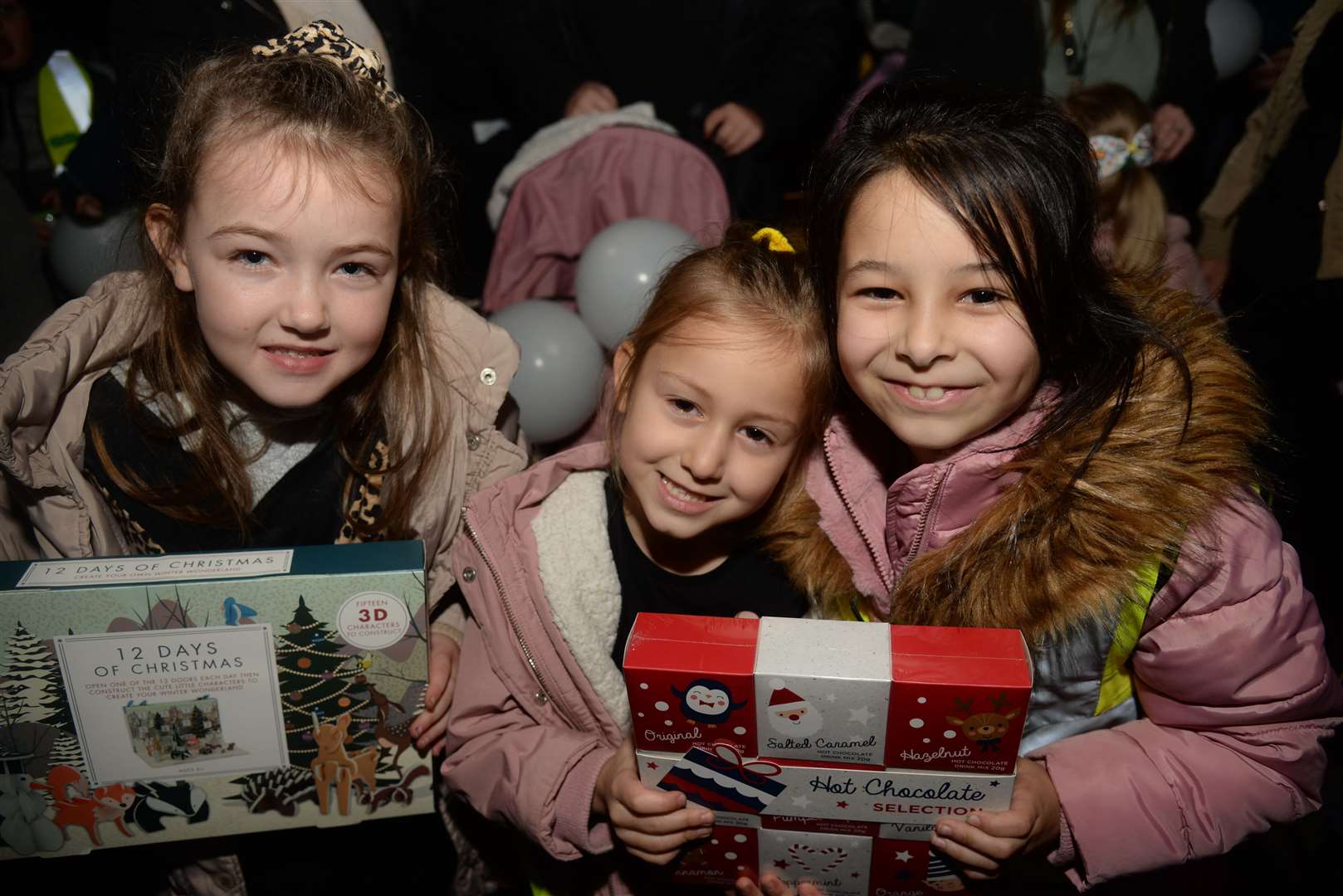 Bobbi Cutajar, seven, Envi, six, and Sienna Kuci, seven, at the Christmas Lights switch-on in Strood. Picture: Chris Davey