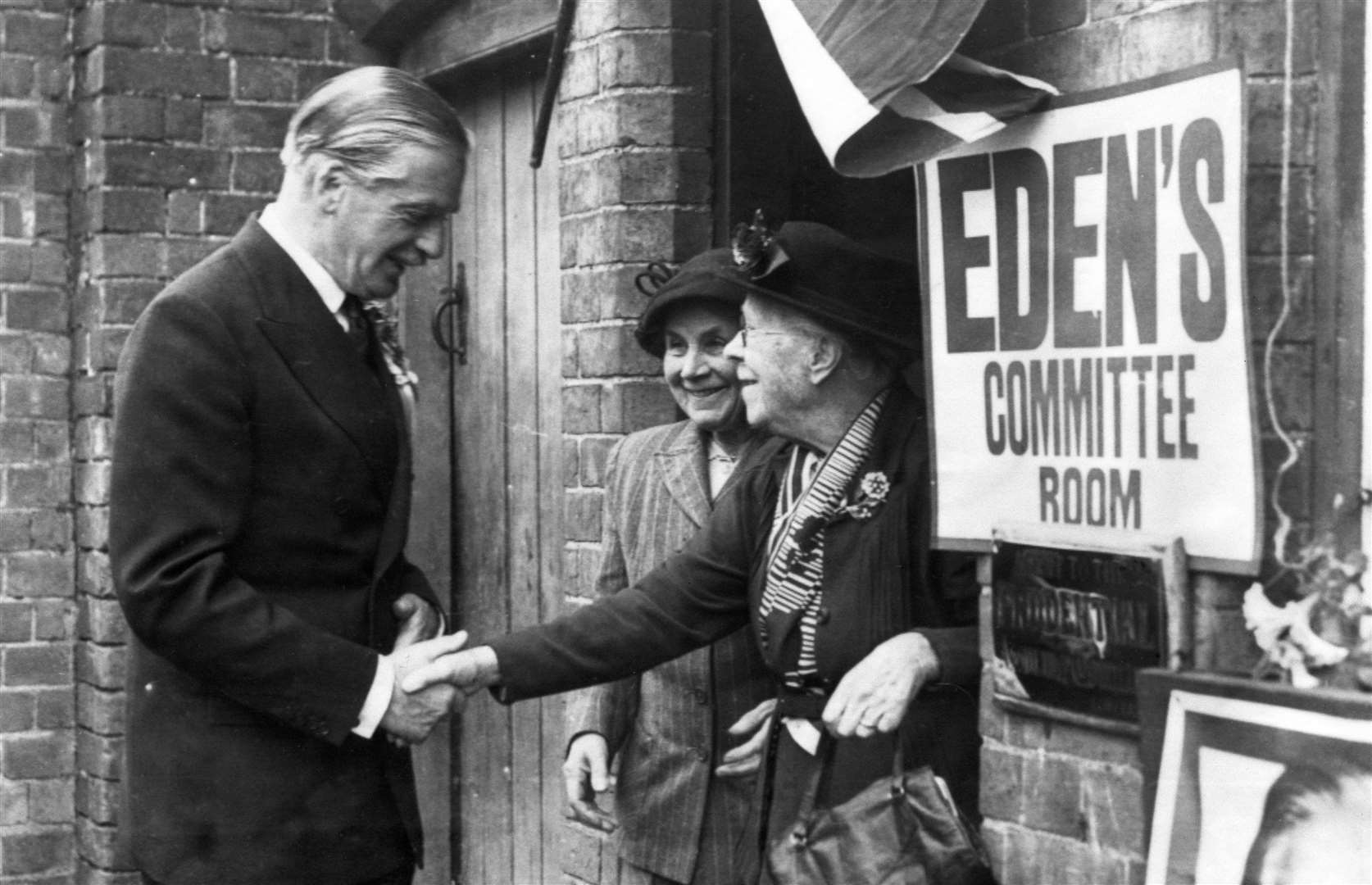 Prime minister Anthony Eden visits polling stations in his constituency of Warwick & Leamington on the day of the 1955 general election (PA)