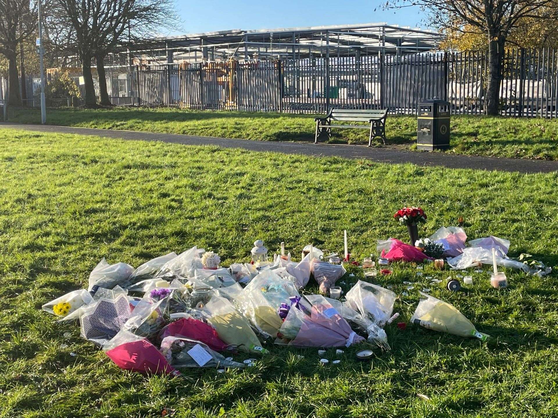 Floral tributes left at the scene in Stowlawn playing fields (Matthew Cooper/PA)