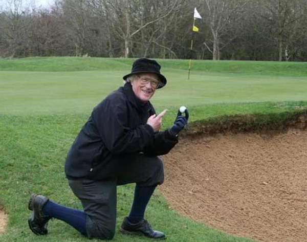 Chris Gay celebrates the eighth hole-in-one of his career