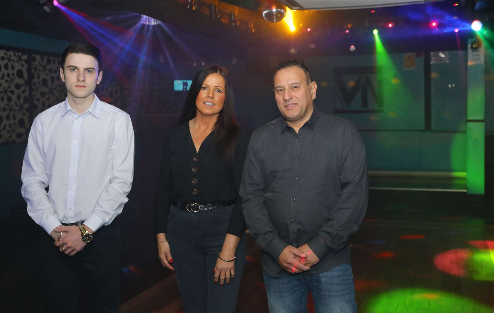 Owner Karl Ahmad, right, stood inside Vivid earlier this year with son Nathan Ahmad and partner Debbie Whitehead