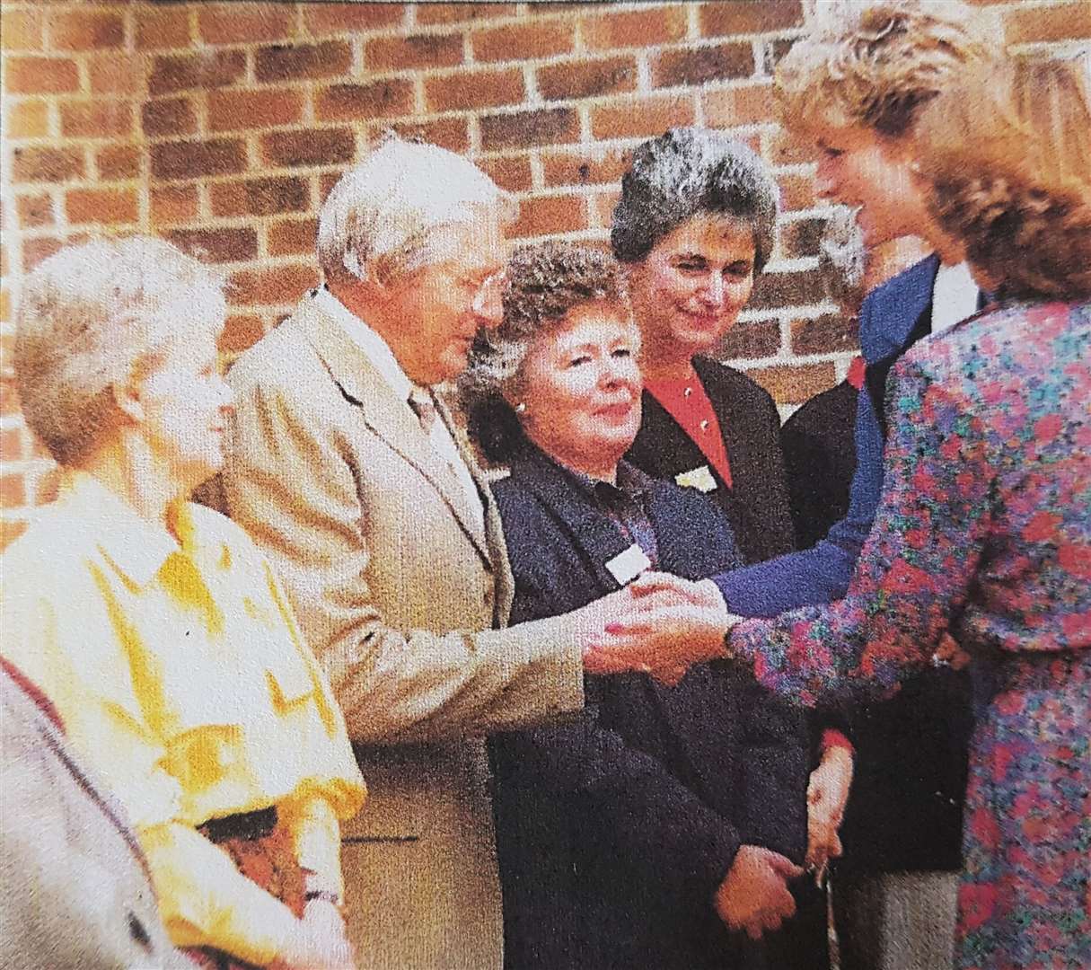 Norma Bennett, who's wearing the red jumper, met Princess Diana in 1992 at the official opening