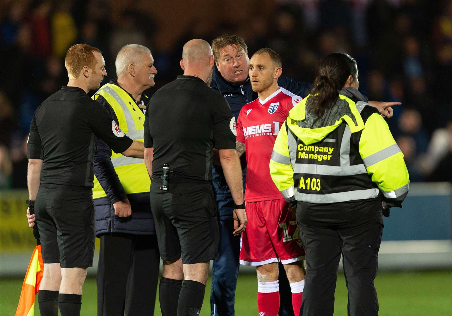 Gills assistant Paul Raynor and Barry Fuller ask questions of referee at the end of their match with AFC Wimbledon Picture: Ady Kerry