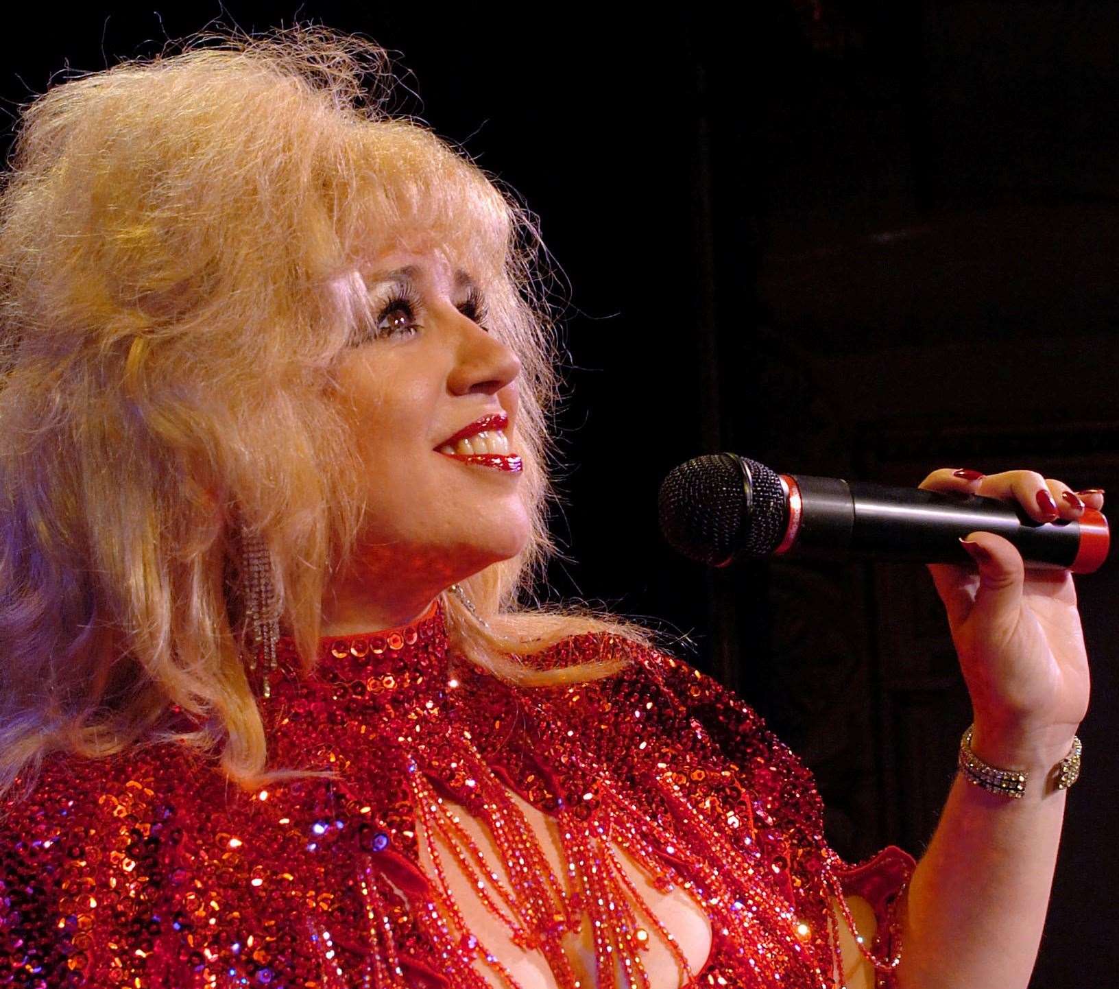 Mandy Winters staring in her own Dolly Parton tribute show