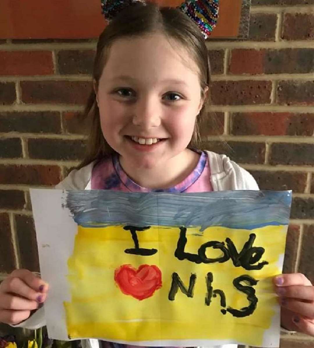 Megan White, 8, painted a picture to thank the staff who looked after her dad. (Claire White)