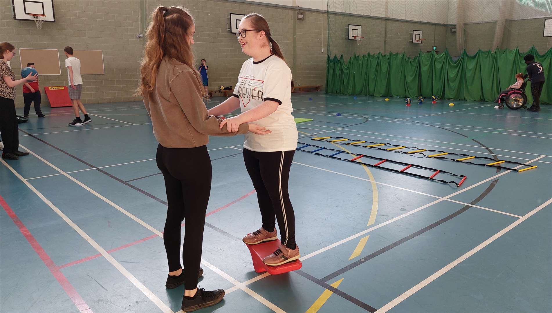 Faye working on her balance during a training session