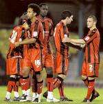 The Gills players console each other at the end of the penalty shoot-out