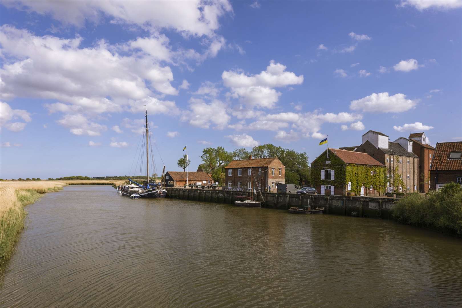 Buildings at the Snape Maltings complex, on the bank of the River Alde in Suffolk (Stella Fitzgerald/Historic England Archive/PA)