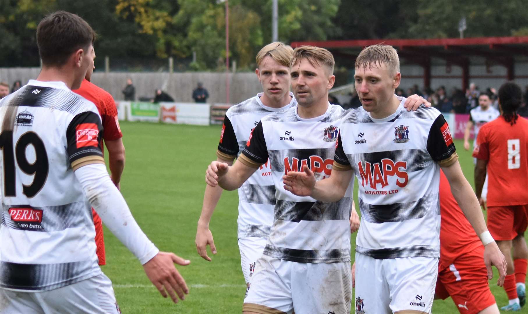 Deal’s players celebrate Ben Chapman's goal in their 4-1 loss at Isthmian South East leaders Beckenham on Saturday. Picture: Alan Coomes