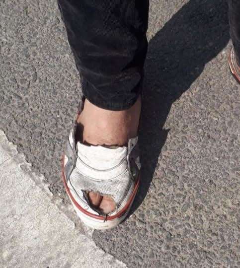 A migrant's battered shoes. Picture: Poppy Cleary (37531158)