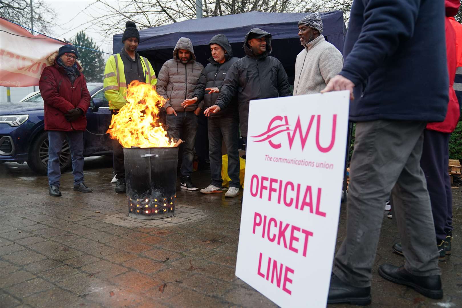 CWU pickets outside the Central Delivery Office and Mail Centre in Birmingham in December (Jacob King/PA)