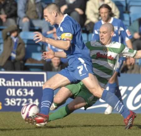 Gillingham skipper Andrew Crofts drives forward from midfield. Picture: GRANT FALVEY