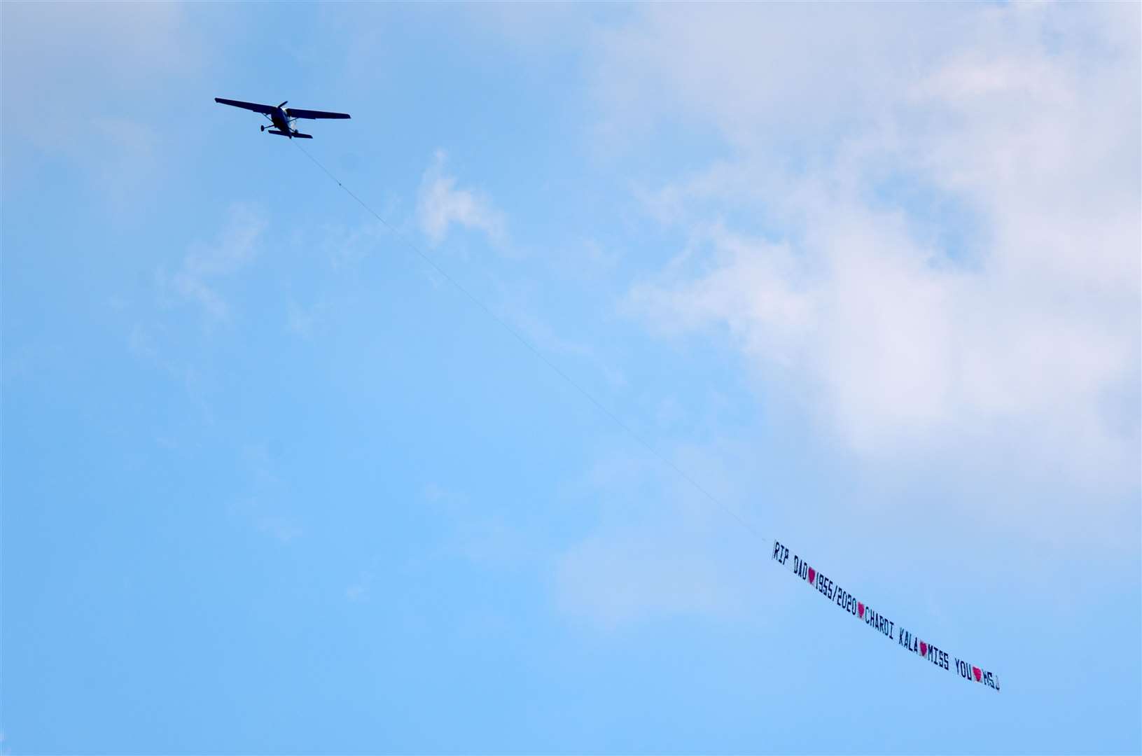 The banner read, RIP DAD, 1955-2020, Chardi Kala, miss you. Picture: Fraser Gray