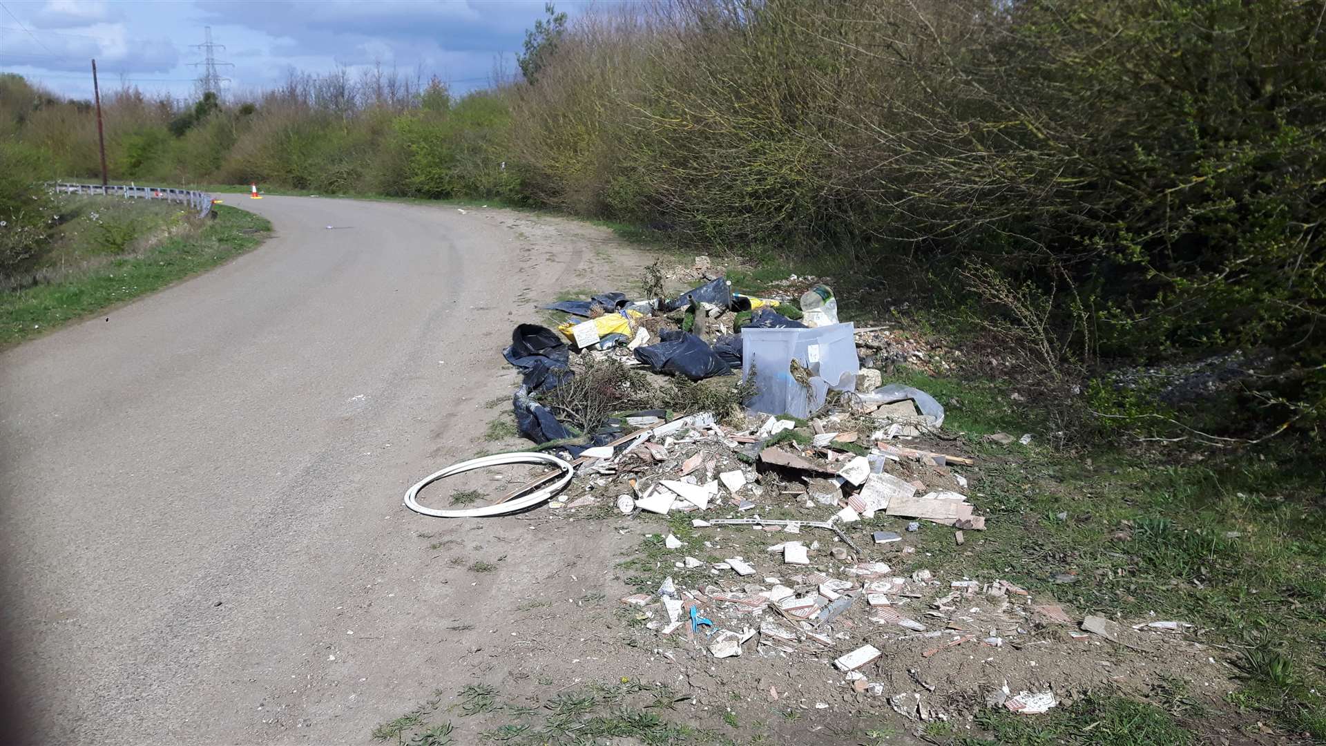 Waste was dumped at intervals along Northfleet Green Road (8279206)