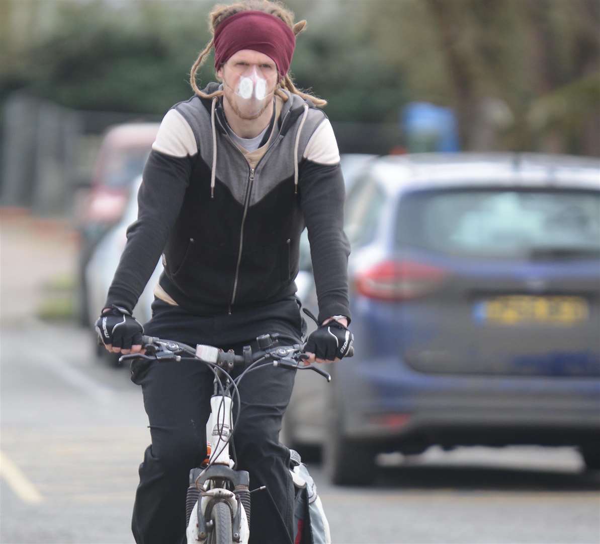 Cyclist Martin Baker wearing his anti-air pollution mask