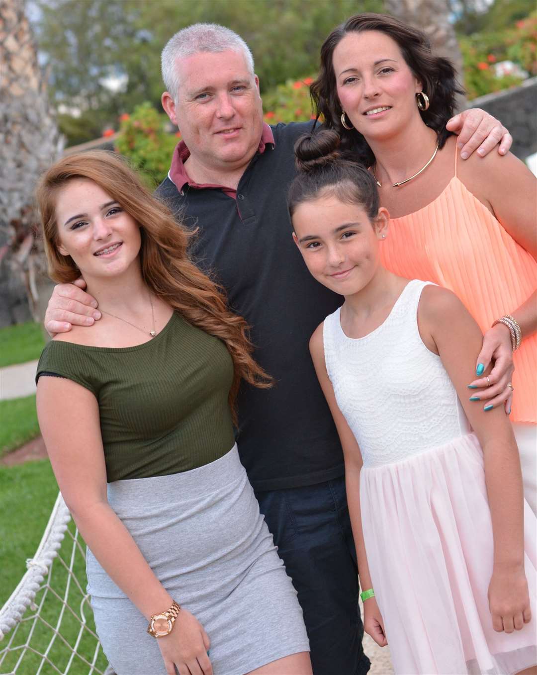 Brian Fernie with his partner and daughters (NHS Lanarkshire/PA)