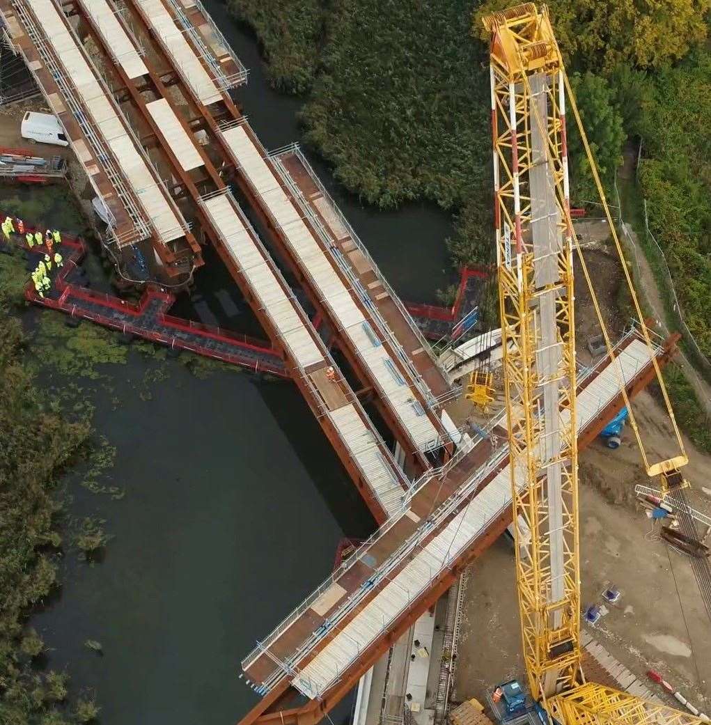 The final bean is lifted into place at Springhead Bridge, across the River Ebbsfleet