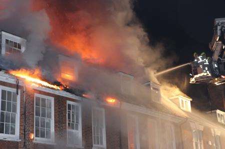 Fire crews battle a blaze in West Malling High Street on January 11, 2013. Picture: Jeffrey Hurst