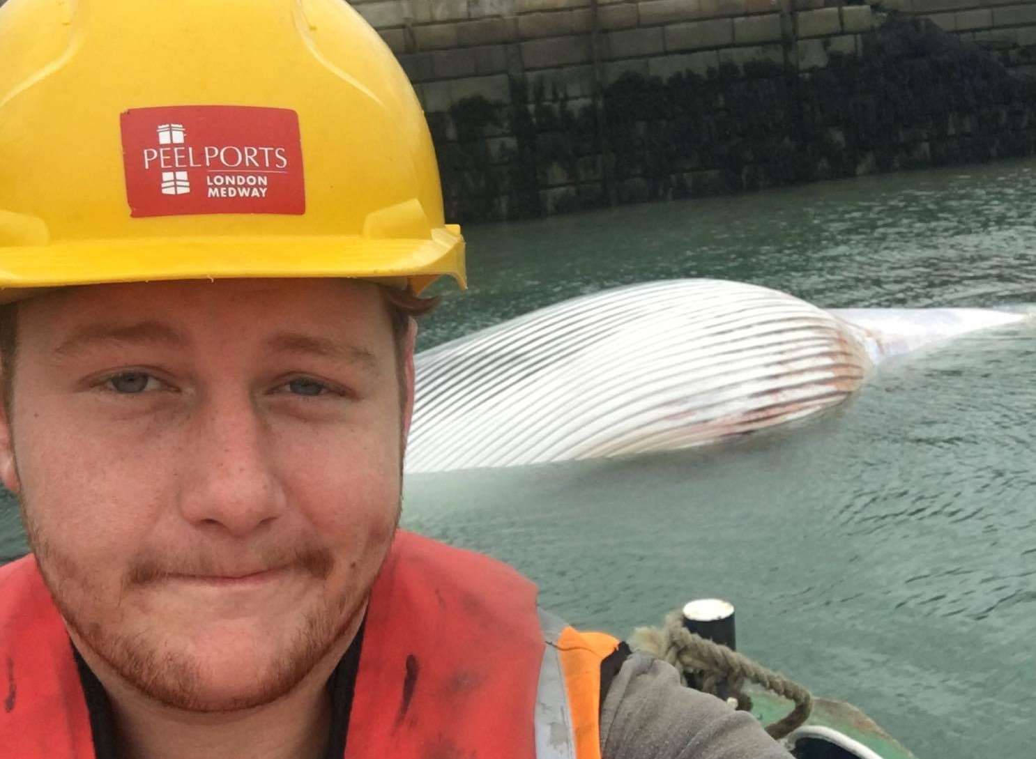 Jack Smedley and the whale carcass he and his crew brought into Sheerness docks