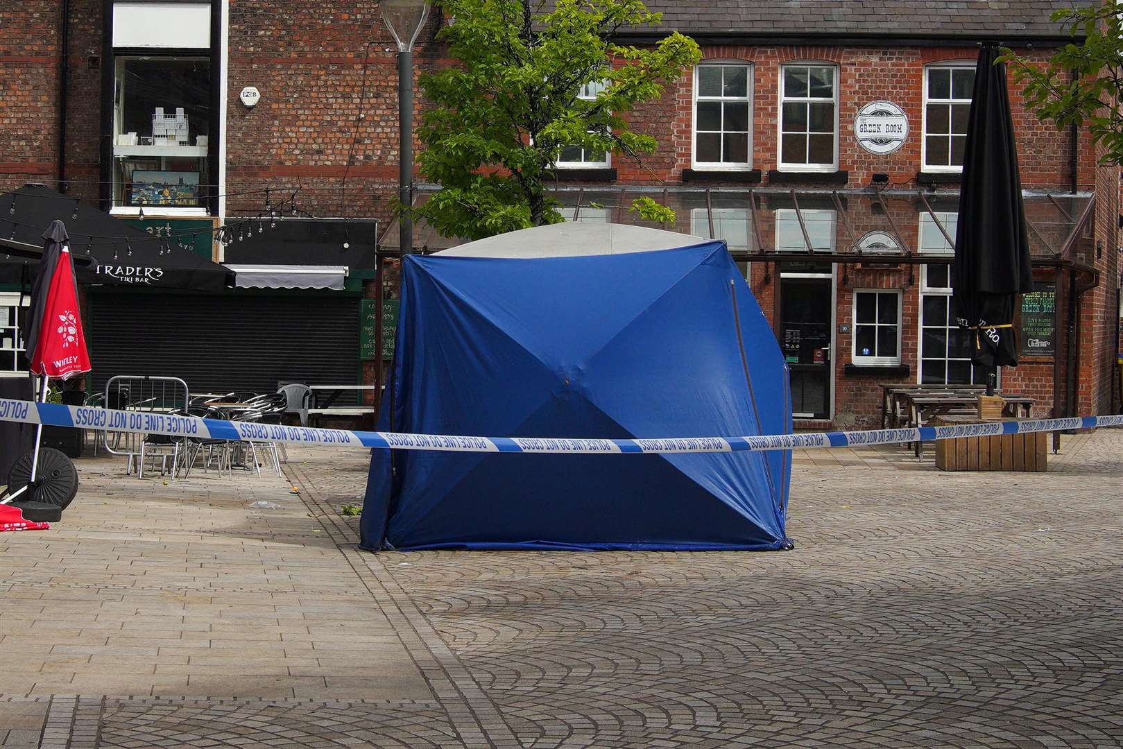 Trouble began after a fight between the defendant’s friends and Rico Burton’s family and friends in a courtyard of bars in Altrincham (Peter Byrne/PA)